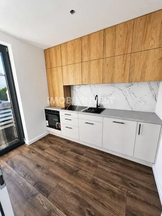 Apartament cu 2 camere, ultracentral, bloc nou din 2026, parcare și garaj, fotografia 1