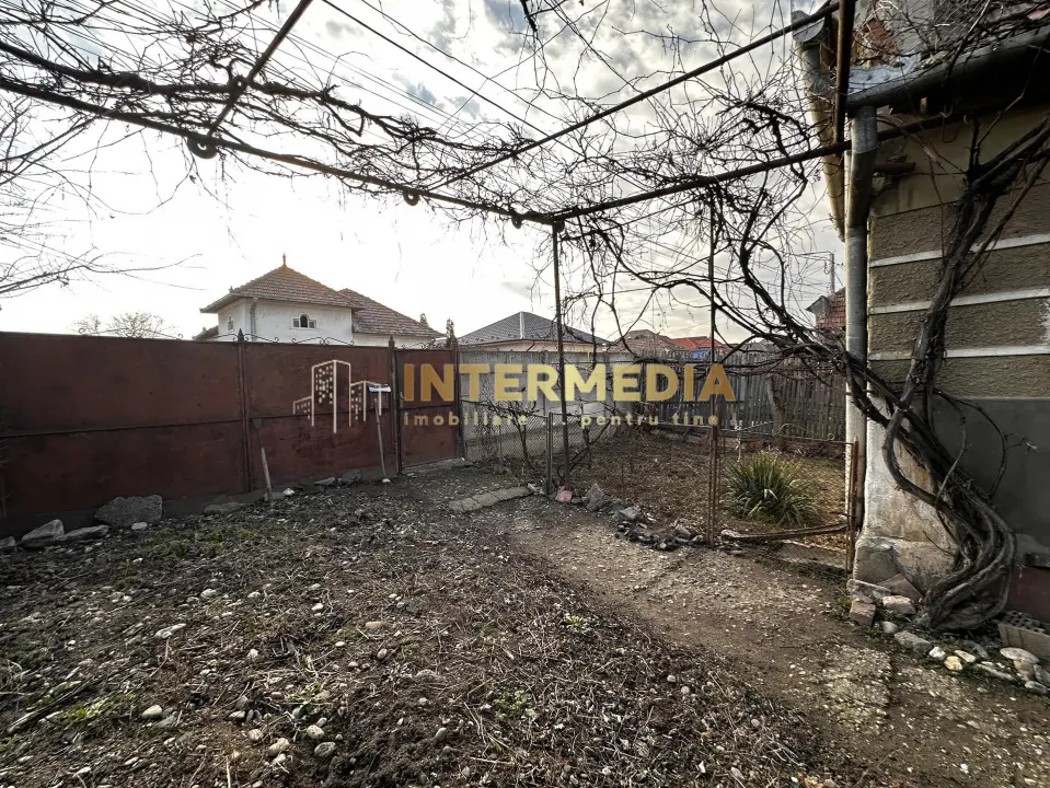Teren Intravilan intrare Barabant 1242 mp. Imprejmuit Asfalt Utilitati Bransate, fotografia 9