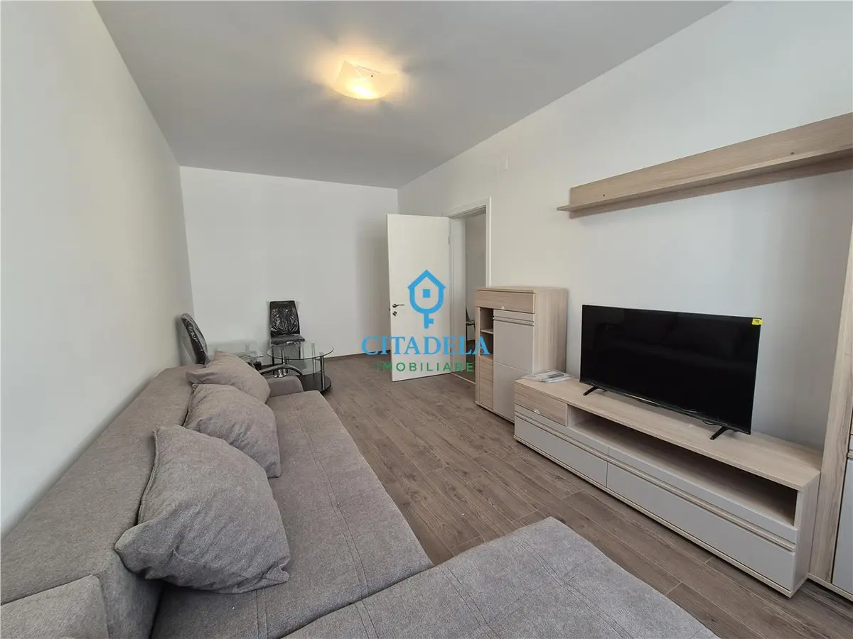Apartament cu 2 camere de închiriat, bloc nou, garaj, zona Centru, fotografia 1