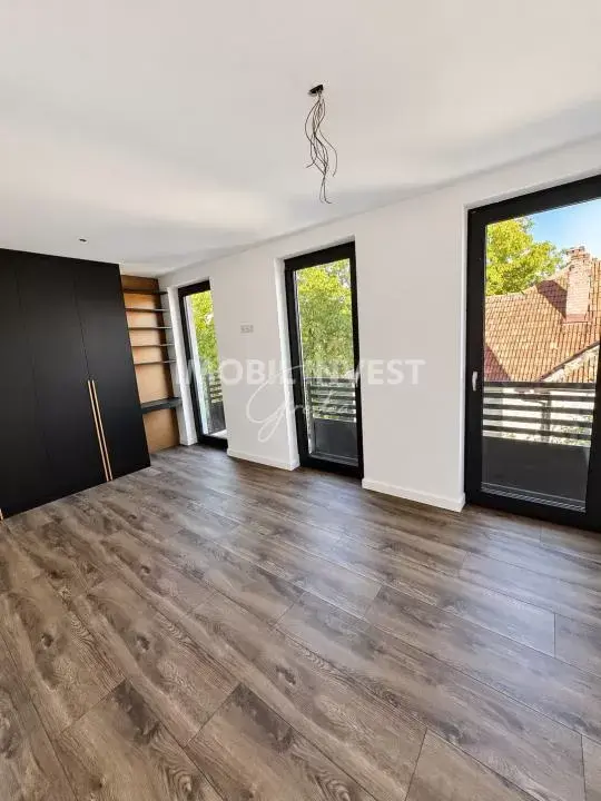 Apartament ultracentral, etaj 1, cu parcare și garaj, bloc nou, fotografia 4