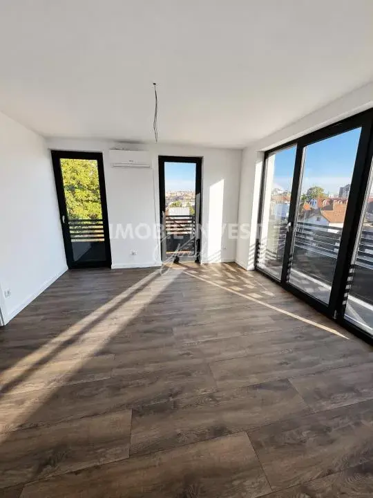 Apartament cu 2 camere, ultracentral, bloc nou din 2026, parcare și garaj, fotografia 2